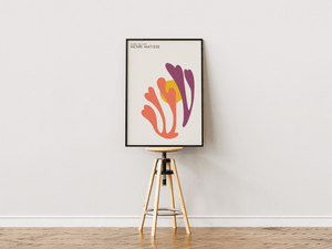 Sunrise Leaves Matisse plakat med abstrakte blade i orange og lilla samt gul cirkel – moderne vægkunst inspireret af Henri Matisse.