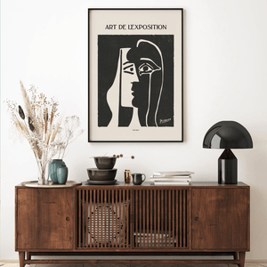 Sort hvid Picasso plakat med kubistisk ansigt og tekst "Art de l’Exposition".