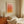 Minimalistisk plakat med orange farveovergange inspireret af solnedgang i moderne indretning