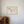 Minimalistisk vinplakat med stregtegning af vinflaske og glas samt teksten “Tell Me When”.
