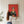 Frida Kahlo plakat med rød baggrund og grøn kimono med blomster