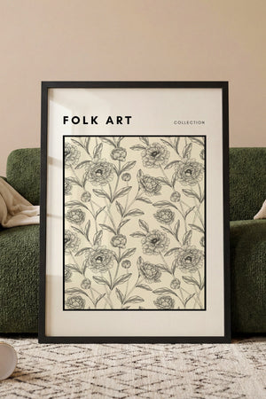 Folk Art blomstermønster plakat i egetræsramme ved sofa
