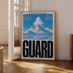 Guard bjerglandskab plakat med grafiske cirkelformer og typografi i egetræsramme på gulv ved vindue