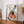 Vintage 7up reklameplakat med hånd der holder en 7up-flaske og teksten “You like it... it likes you!” i retro design