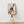 Vintage 7up reklameplakat med hånd der holder en 7up-flaske og teksten “You like it... it likes you!” i retro design